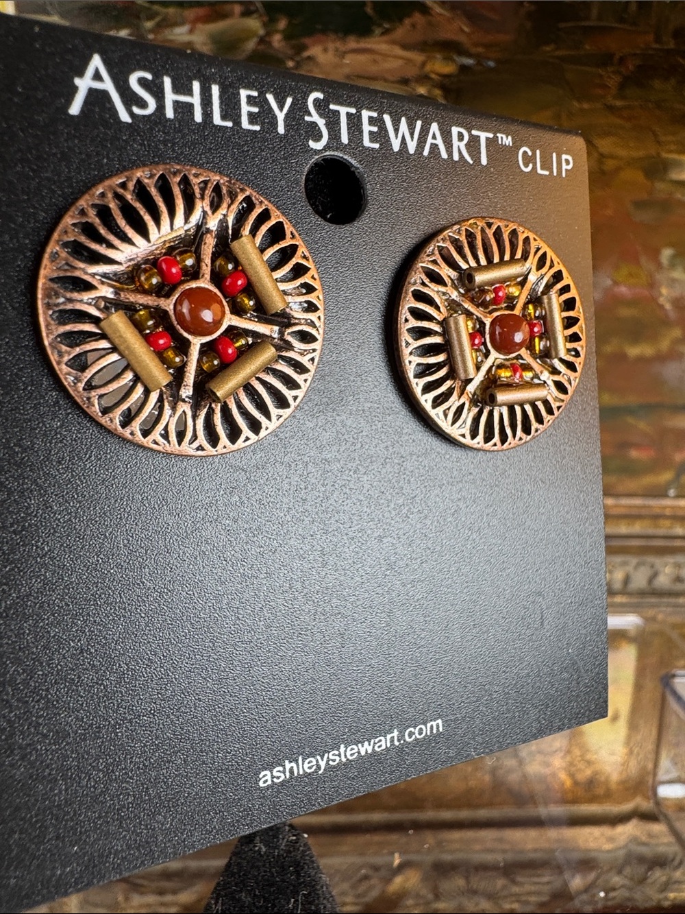 0712-Ashley Stewart Copper-Tone Round Earrings with Red Accents